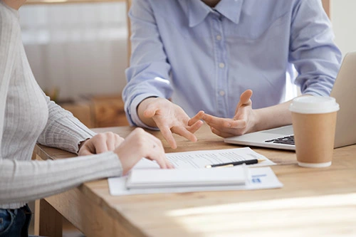 two people discussing